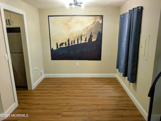 101 Begonia Ct, Jackson, NJ 08527 - unfurnished room with wood finished floors and a textured ceiling