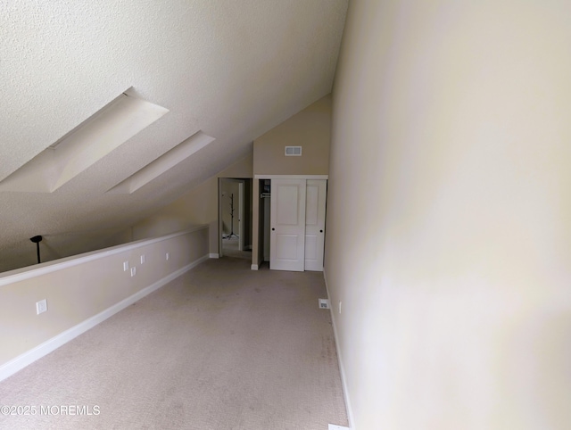 101 Begonia Ct, Jackson, NJ 08527 - bonus room with lofted ceiling, carpet flooring, and a skylight