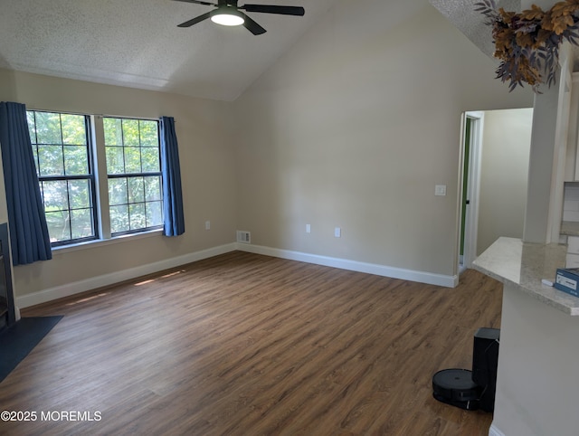 101 Begonia Ct, Jackson, NJ 08527 - empty room featuring ceiling fan, dark wood-type flooring, high vaulted ceiling, and a textured ceiling