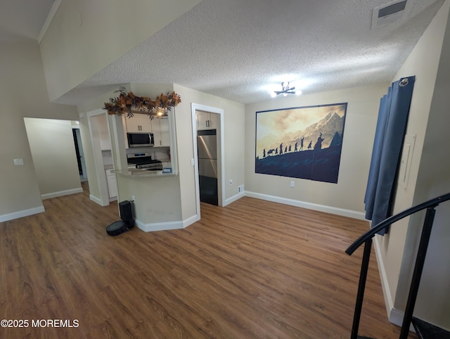 101 Begonia Ct, Jackson, NJ 08527 - unfurnished living room featuring wood finished floors and a textured ceiling