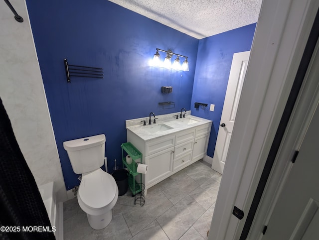101 Begonia Ct, Jackson, NJ 08527 - full bathroom featuring a textured ceiling, double vanity, and a bathtub