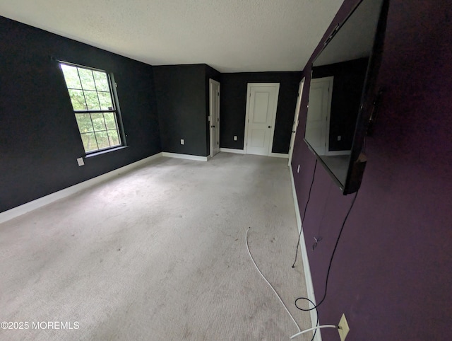 101 Begonia Ct, Jackson, NJ 08527 - empty room with a textured ceiling and light carpet