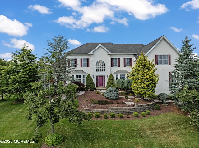 1 Hopkinson Ct, Marlboro, NJ 07746 - colonial-style house featuring a front yard and stucco siding