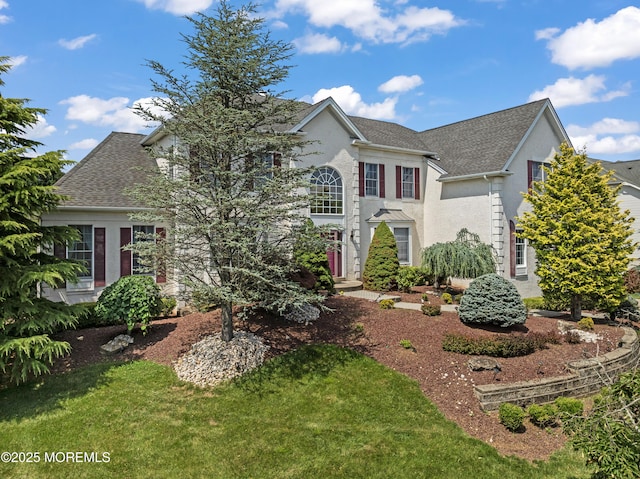 1 Hopkinson Ct, Marlboro, NJ 07746 - colonial-style house featuring stucco siding, roof with shingles, and a front yard