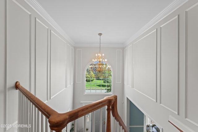 1 Hopkinson Ct, Marlboro, NJ 07746 - corridor featuring an upstairs landing, a chandelier, a decorative wall, and crown molding
