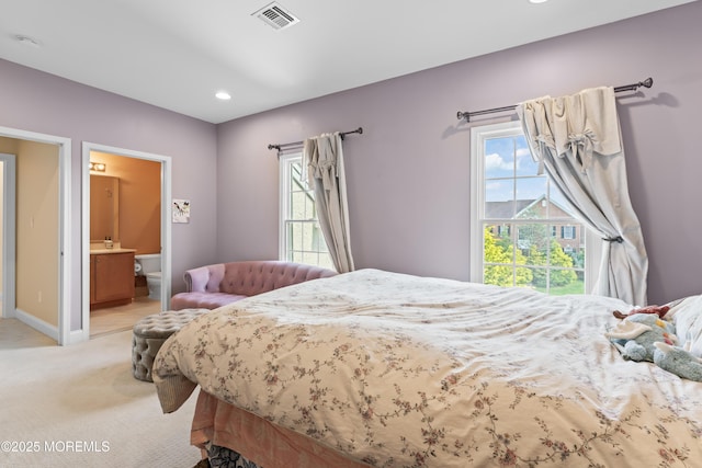 1 Hopkinson Ct, Marlboro, NJ 07746 - bedroom with light colored carpet, recessed lighting, and connected bathroom