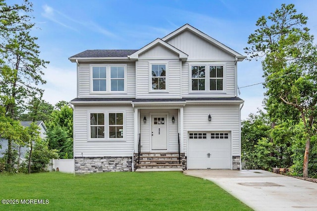 629 Monmouth Ave, Toms River, NJ 08757 - view of front facade featuring driveway, an attached garage, and a front yard