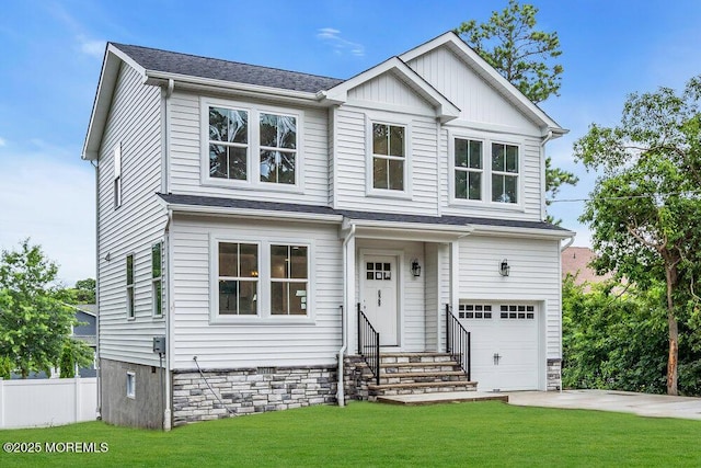 629 Monmouth Ave, Toms River, NJ 08757 - view of front of home featuring entry steps, a garage, a front lawn, concrete driveway, and board and batten siding