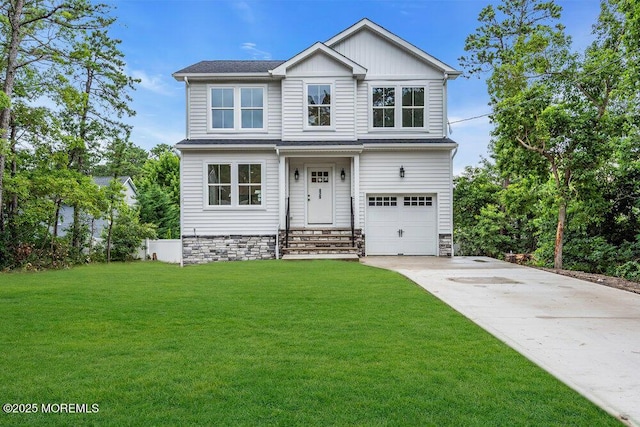 629 Monmouth Ave, Toms River, NJ 08757 - view of front of property with driveway, a front yard, a garage, and board and batten siding
