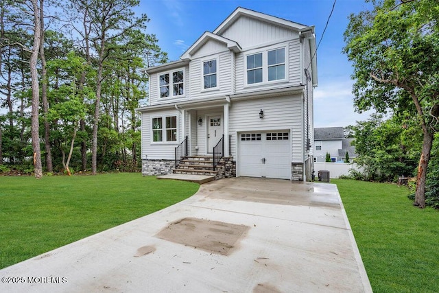 629 Monmouth Ave, Toms River, NJ 08757 - view of front of house with driveway, a front yard, a garage, and board and batten siding