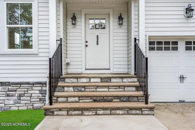 629 Monmouth Ave, Toms River, NJ 08757 - doorway to property featuring a garage