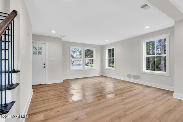 629 Monmouth Ave, Toms River, NJ 08757 - foyer featuring light wood-type flooring, healthy amount of natural light, recessed lighting, and stairs