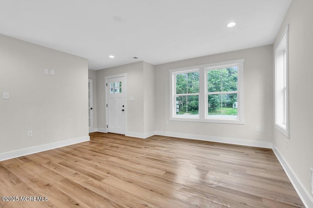 629 Monmouth Ave, Toms River, NJ 08757 - unfurnished living room featuring light wood-style flooring and recessed lighting