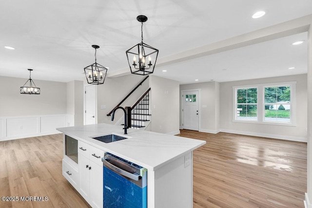 629 Monmouth Ave, Toms River, NJ 08757 - kitchen with dishwashing machine, a chandelier, decorative light fixtures, light countertops, and recessed lighting