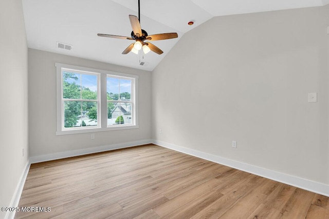 629 Monmouth Ave, Toms River, NJ 08757 - unfurnished room with lofted ceiling, light wood-style flooring, and a ceiling fan