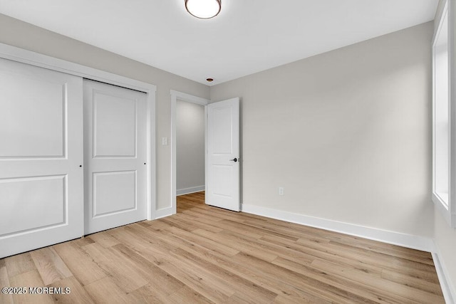 629 Monmouth Ave, Toms River, NJ 08757 - unfurnished bedroom with light wood-style flooring and a closet