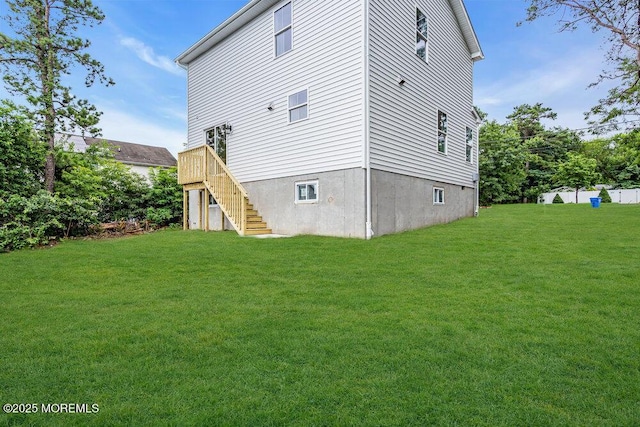 629 Monmouth Ave, Toms River, NJ 08757 - view of home's exterior with stairs, a lawn, and a wooden deck