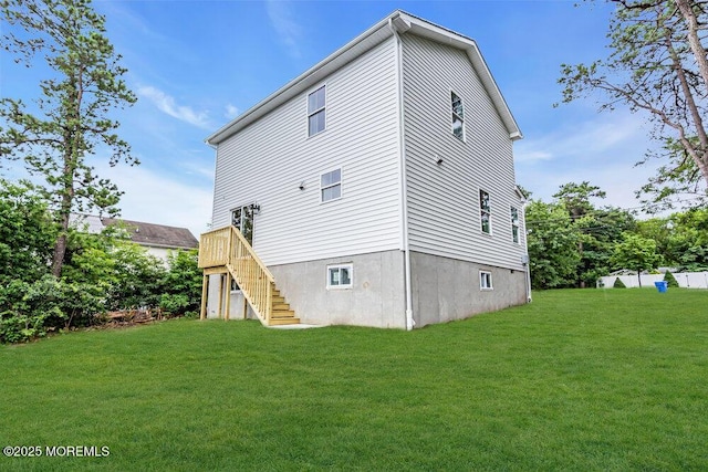 629 Monmouth Ave, Toms River, NJ 08757 - rear view of house with stairway and a lawn