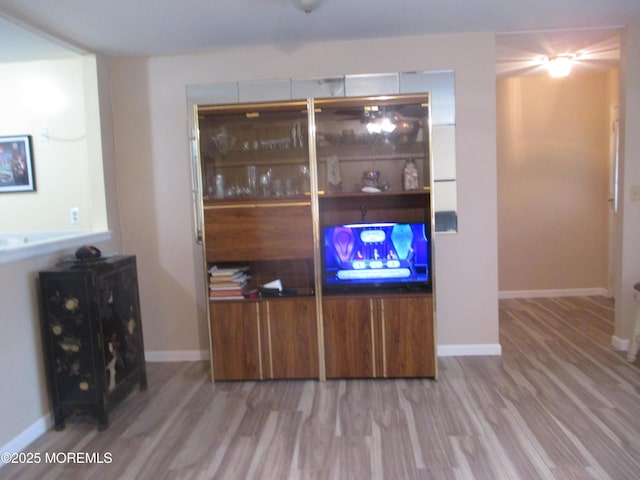 496A Thornbury Ct, Lakewood, NJ 08701 - living room with wood finished floors and baseboards