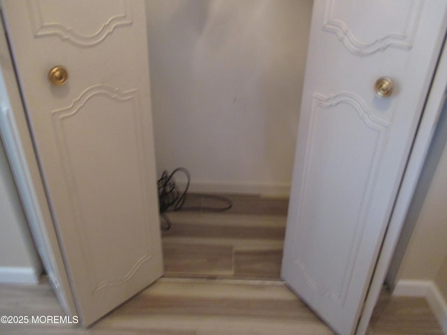 496A Thornbury Ct, Lakewood, NJ 08701 - detailed view of wood finished floors and baseboards