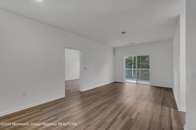 750 Lighthouse Dr Unit 1306, Barnegat, NJ 08005 - empty room with wood finished floors and baseboards