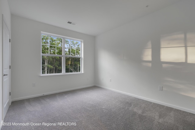 750 Lighthouse Dr Unit 1306, Barnegat, NJ 08005 - carpeted empty room featuring baseboards