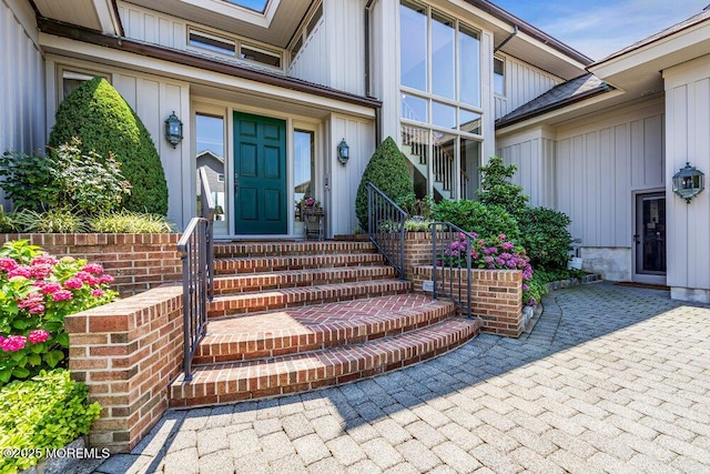 787 Princeton Ave, Brick, NJ 08724 - doorway to property with board and batten siding