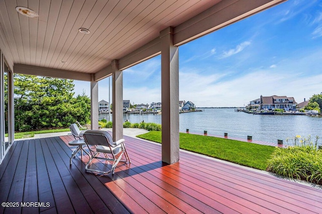 787 Princeton Ave, Brick, NJ 08724 - wooden terrace with a water view and a lawn