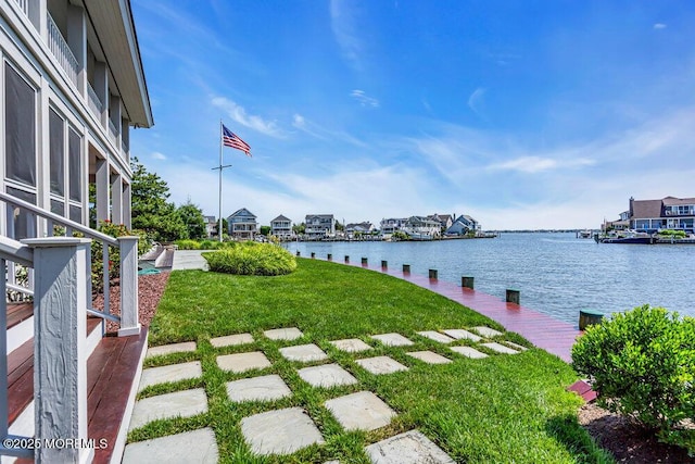 787 Princeton Ave, Brick, NJ 08724 - view of grassy yard with a water view and a boat dock