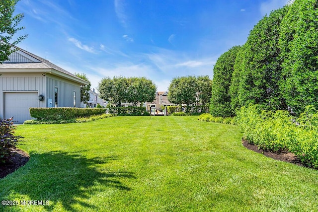 787 Princeton Ave, Brick, NJ 08724 - view of green lawn with an attached garage
