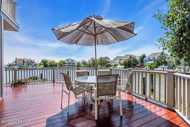 787 Princeton Ave, Brick, NJ 08724 - wooden terrace featuring outdoor dining space, a residential view, and a water view