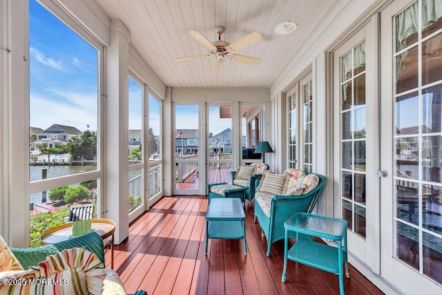 787 Princeton Ave, Brick, NJ 08724 - sunroom featuring a water view, wood-type flooring, and a ceiling fan