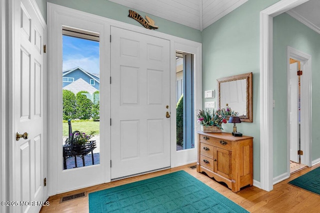 787 Princeton Ave, Brick, NJ 08724 - foyer featuring light wood finished floors and crown molding