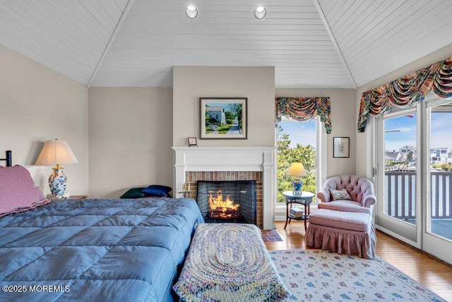 787 Princeton Ave, Brick, NJ 08724 - bedroom with access to outside, wood finished floors, wood ceiling, a fireplace, and vaulted ceiling