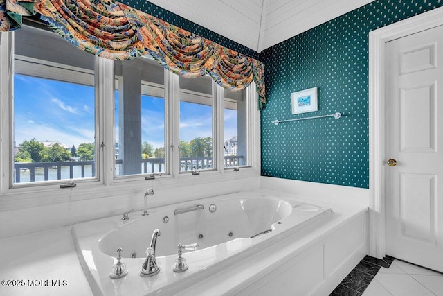 787 Princeton Ave, Brick, NJ 08724 - bathroom featuring a jetted tub, healthy amount of natural light, tile patterned floors, and wallpapered walls