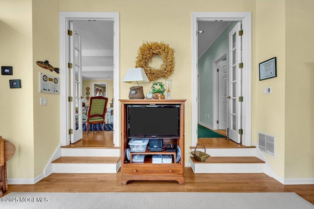 787 Princeton Ave, Brick, NJ 08724 - hallway with wood finished floors and stairway