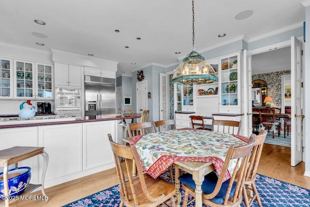 787 Princeton Ave, Brick, NJ 08724 - dining space with light wood-style floors and ornamental molding
