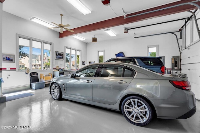 787 Princeton Ave, Brick, NJ 08724 - garage with a ceiling fan, a garage door opener, and electric panel