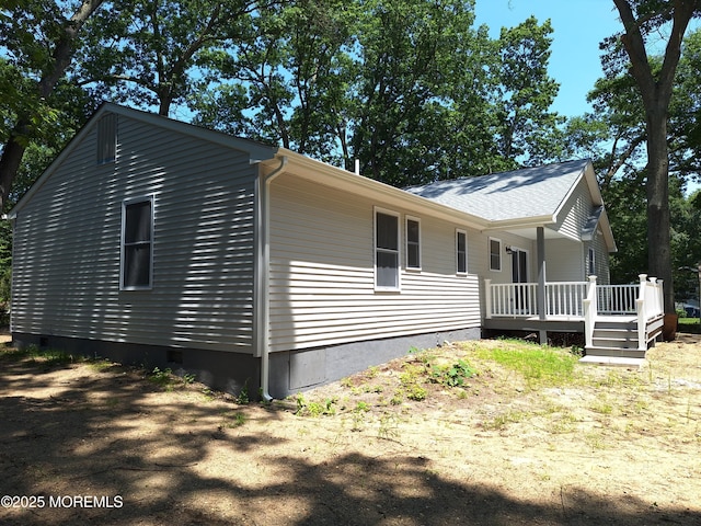 414 Oak Tree Rd, Freehold, NJ 07728 - view of property exterior with crawl space and a wooden deck