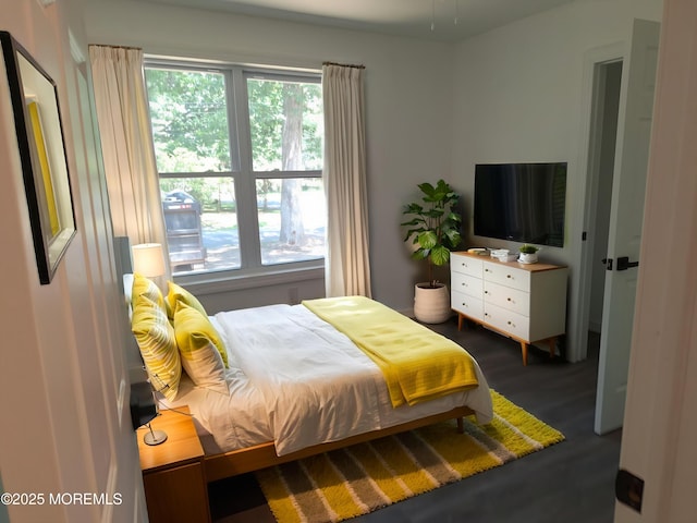 414 Oak Tree Rd, Freehold, NJ 07728 - bedroom with multiple windows and wood finished floors