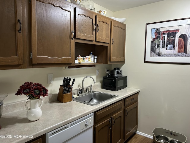 882 Balmoral Ct Unit D, Lakewood, NJ 08701 - kitchen with dishwasher, black microwave, light countertops, dark wood-style floors, and open shelves