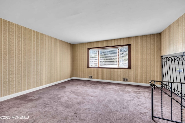 3 Colorado Dr, Hazlet, NJ 07730 - empty room featuring carpet floors and wallpapered walls