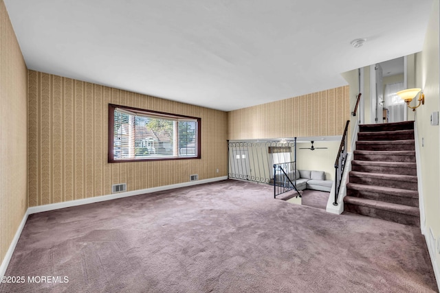 3 Colorado Dr, Hazlet, NJ 07730 - empty room with wallpapered walls, carpet, and stairs