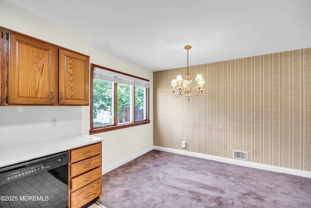 3 Colorado Dr, Hazlet, NJ 07730 - kitchen with dishwasher, brown cabinetry, a chandelier, carpet flooring, and light countertops
