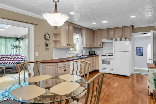 1914 Oak Dale Rd, Toms River, NJ 08753 - kitchen with white appliances, under cabinet range hood, dark countertops, light wood finished floors, and recessed lighting