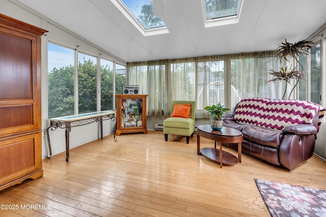 1914 Oak Dale Rd, Toms River, NJ 08753 - sunroom featuring a skylight, hardwood / wood-style flooring, a wooden deck, and a baseboard radiator
