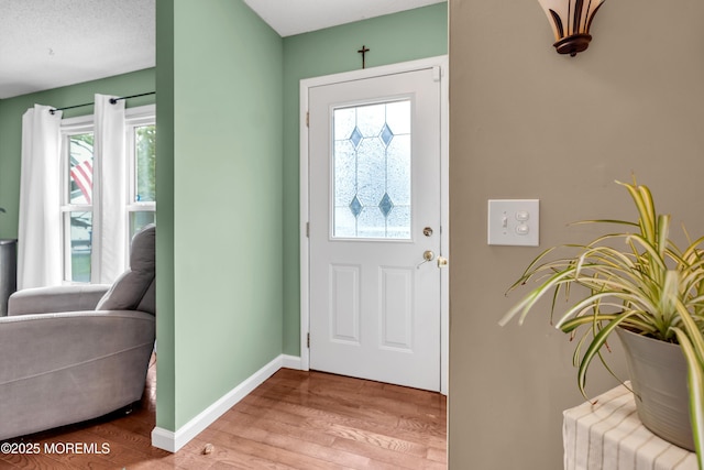 1914 Oak Dale Rd, Toms River, NJ 08753 - foyer entrance with wood finished floors and baseboards