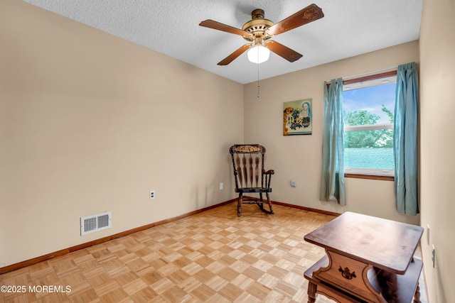 1914 Oak Dale Rd, Toms River, NJ 08753 - sitting room with ceiling fan and a textured ceiling