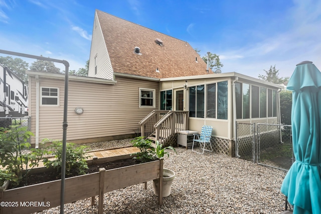 1914 Oak Dale Rd, Toms River, NJ 08753 - back of property with a sunroom and a shingled roof