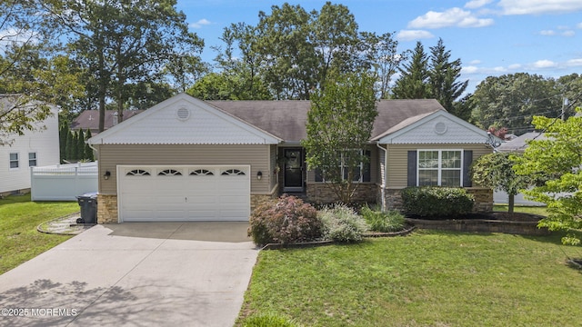 1587 Fort St, Brick, NJ 08724 - view of front of home with stone siding, concrete driveway, a garage, and a front lawn